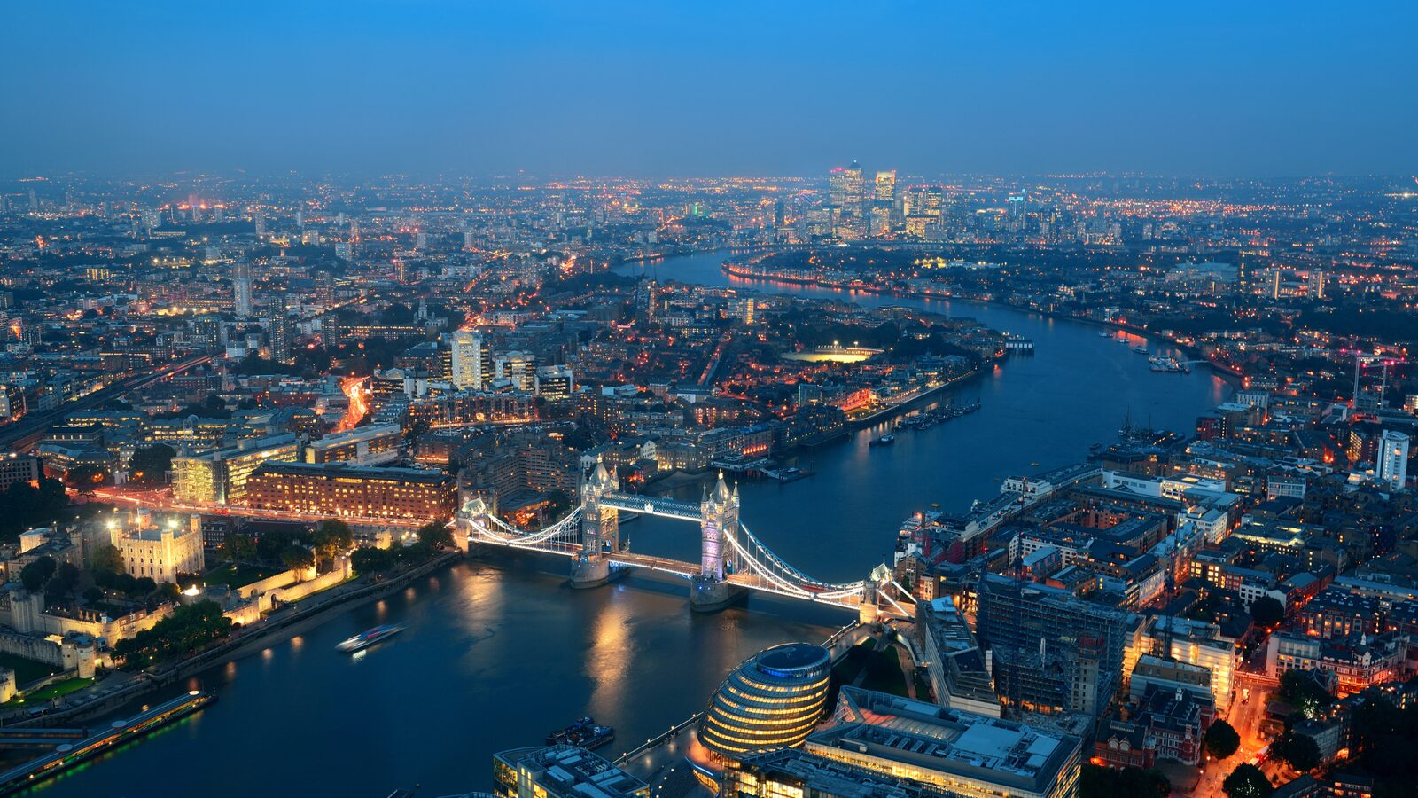Aerial view of the City of London and Tower Bridge at night