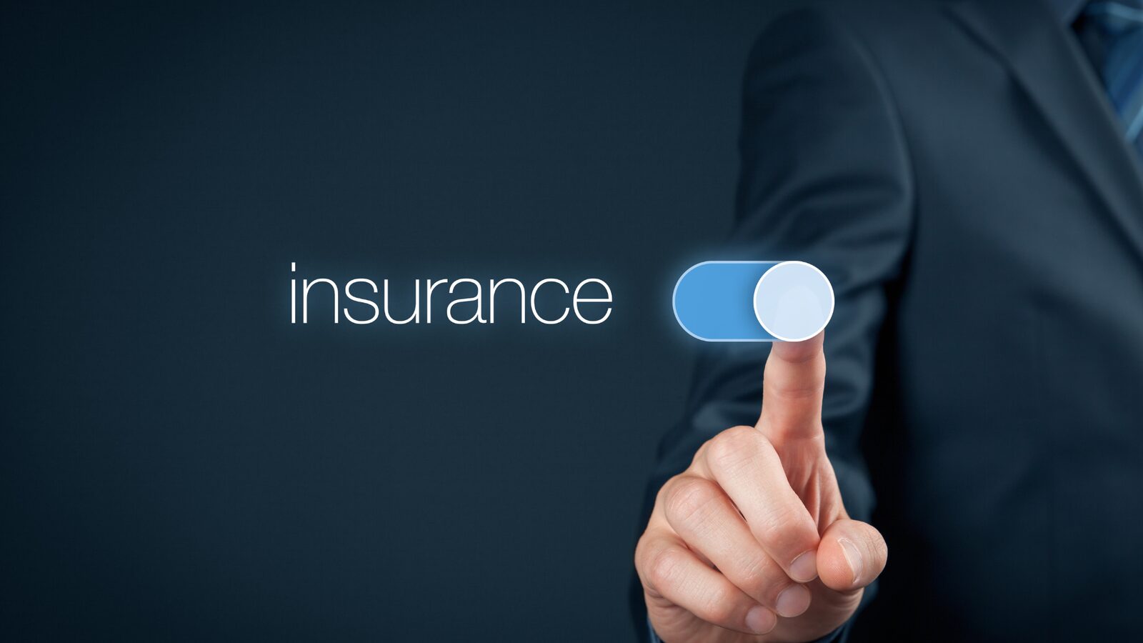A businessman activating an insurance control